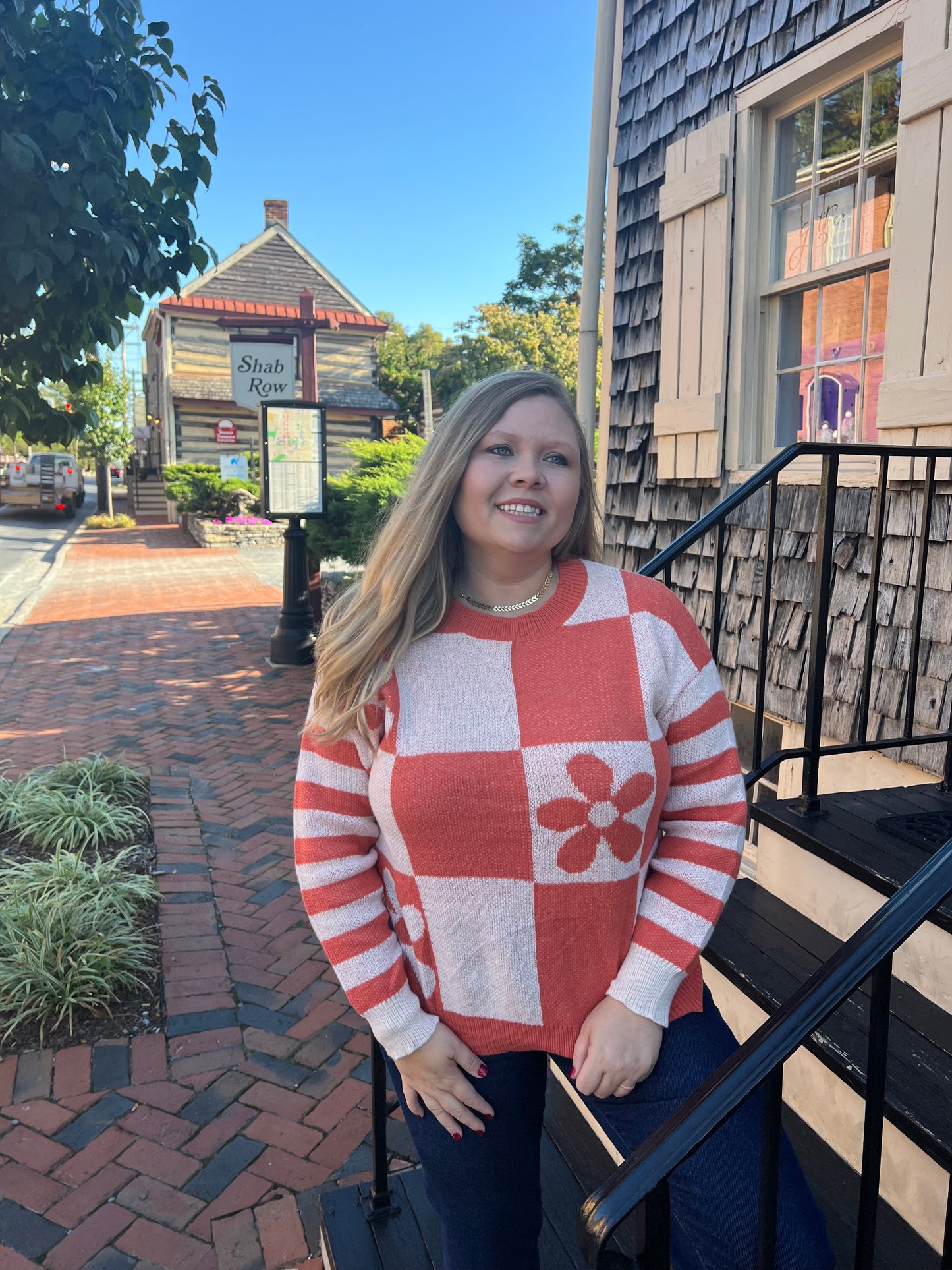 Carrot Checkered Flower Sweater